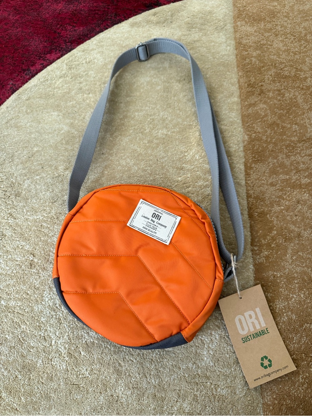 Ori London vibrant orange round crossbody bag sustainable NWT